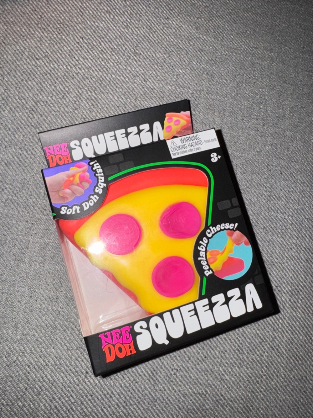 NeeDoh Squeezzza Yellow & Pink Pizza Slice Stress Toy Orange Crust